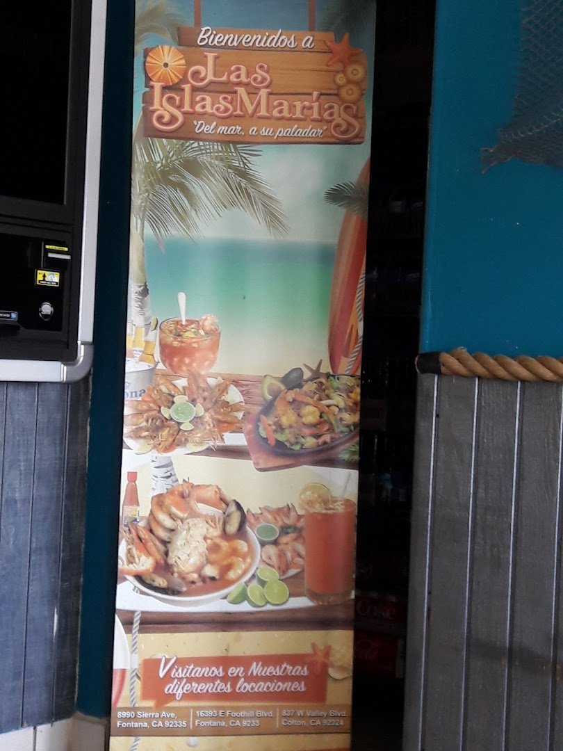 Colorful Mexican seafood dishes in a dining room.