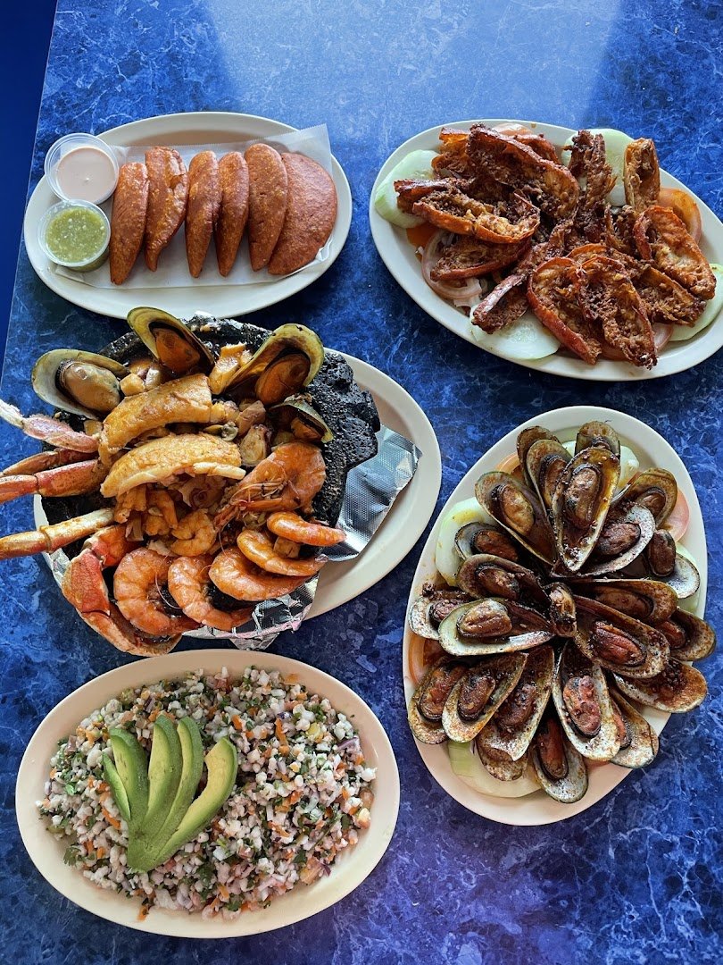 A casual strip-mall seafood restaurant interior.