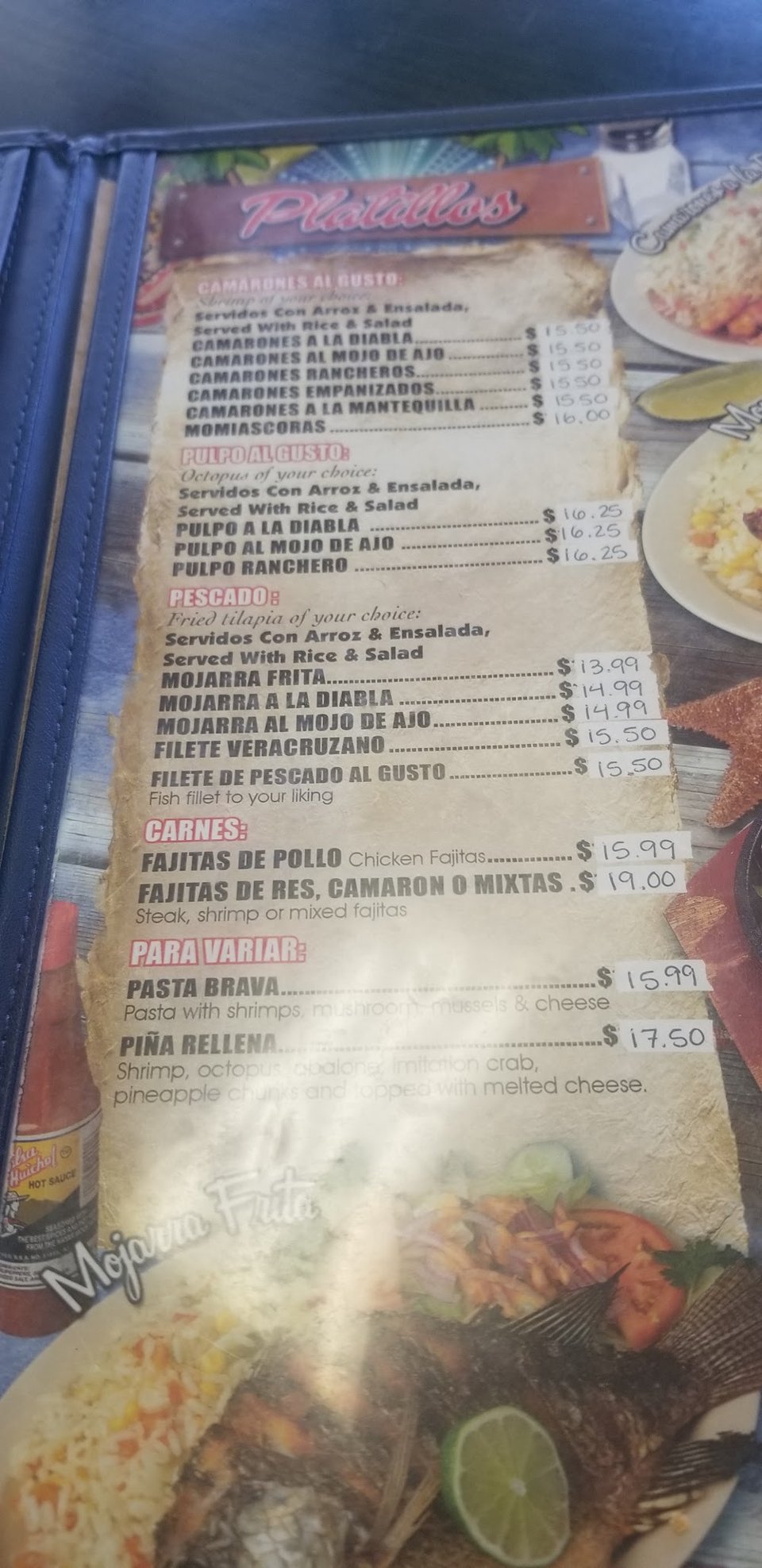 Restaurant menu showing hot appetizers and seafood.