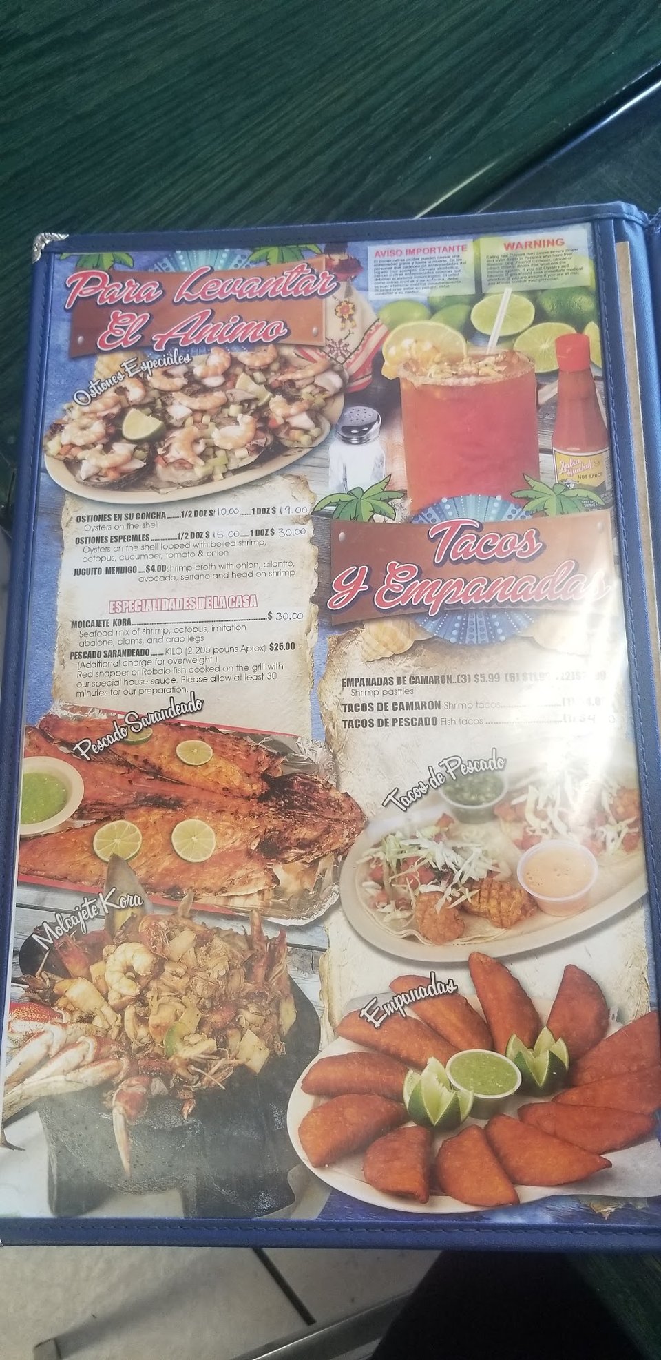 Printed menu with seafood and Mexican dishes.